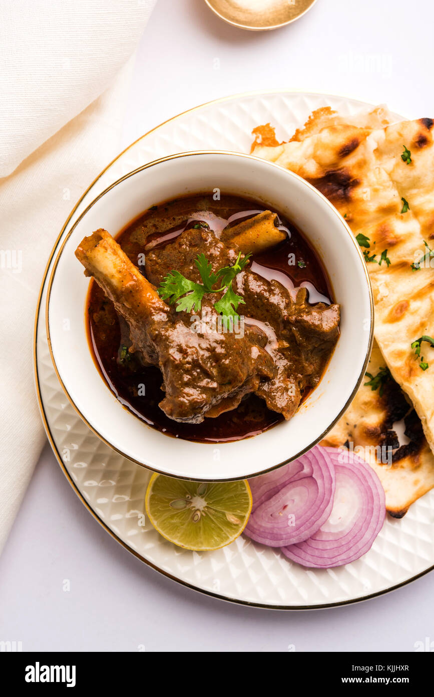 Mutton Masala Or Masala Gosht or indian lamb rogan josh with some