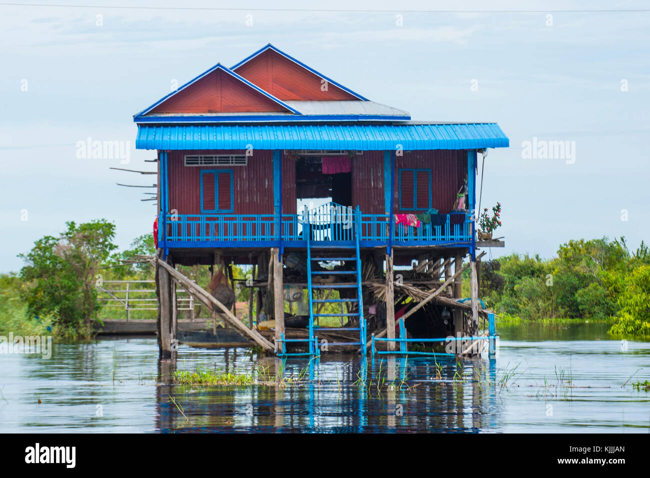 Traditional wooden stilt houses in Tonle sap lake Cambodia Stock Photo