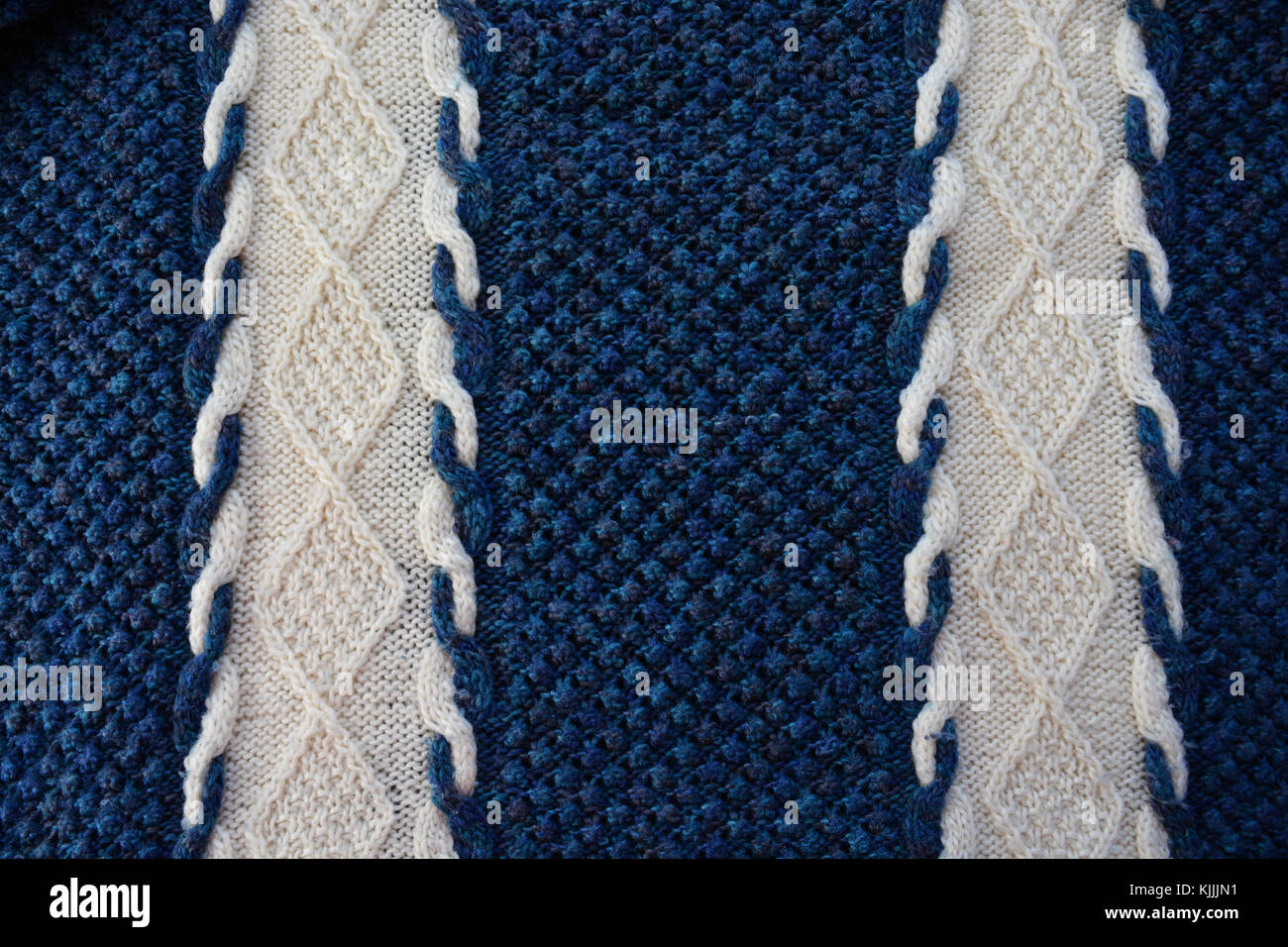 Detail of a woollen, hand knitted sweater Stock Photo