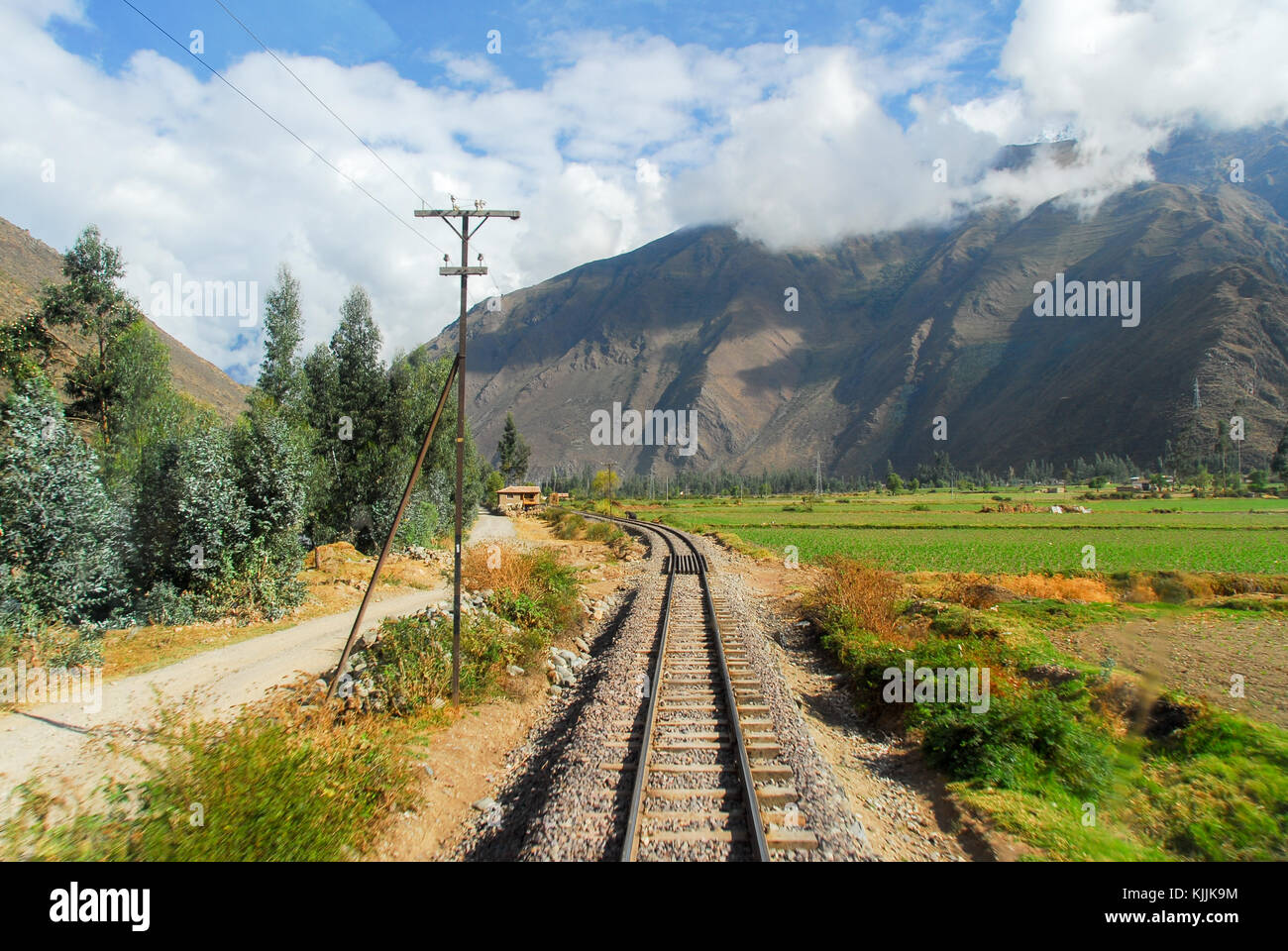 Railroad Tracks through the Andes Mountains in Peru, between Cusco and Machu Picchu Stock Photo
