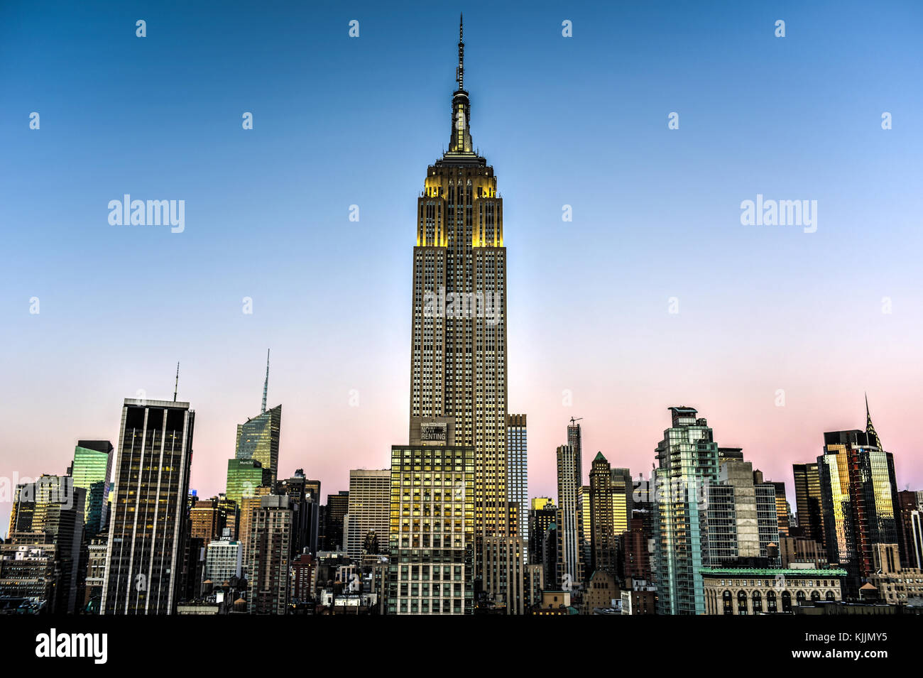 New York City skyline with urban skyscrapers at sunset Stock Photo - Alamy