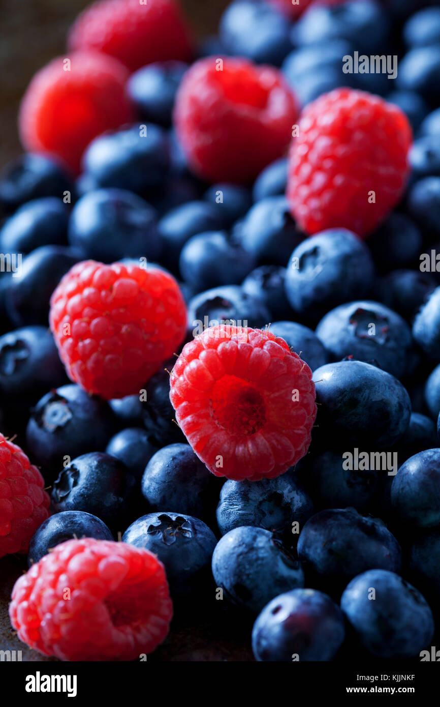 Blueberries and raspberries, close-up Stock Photo - Alamy