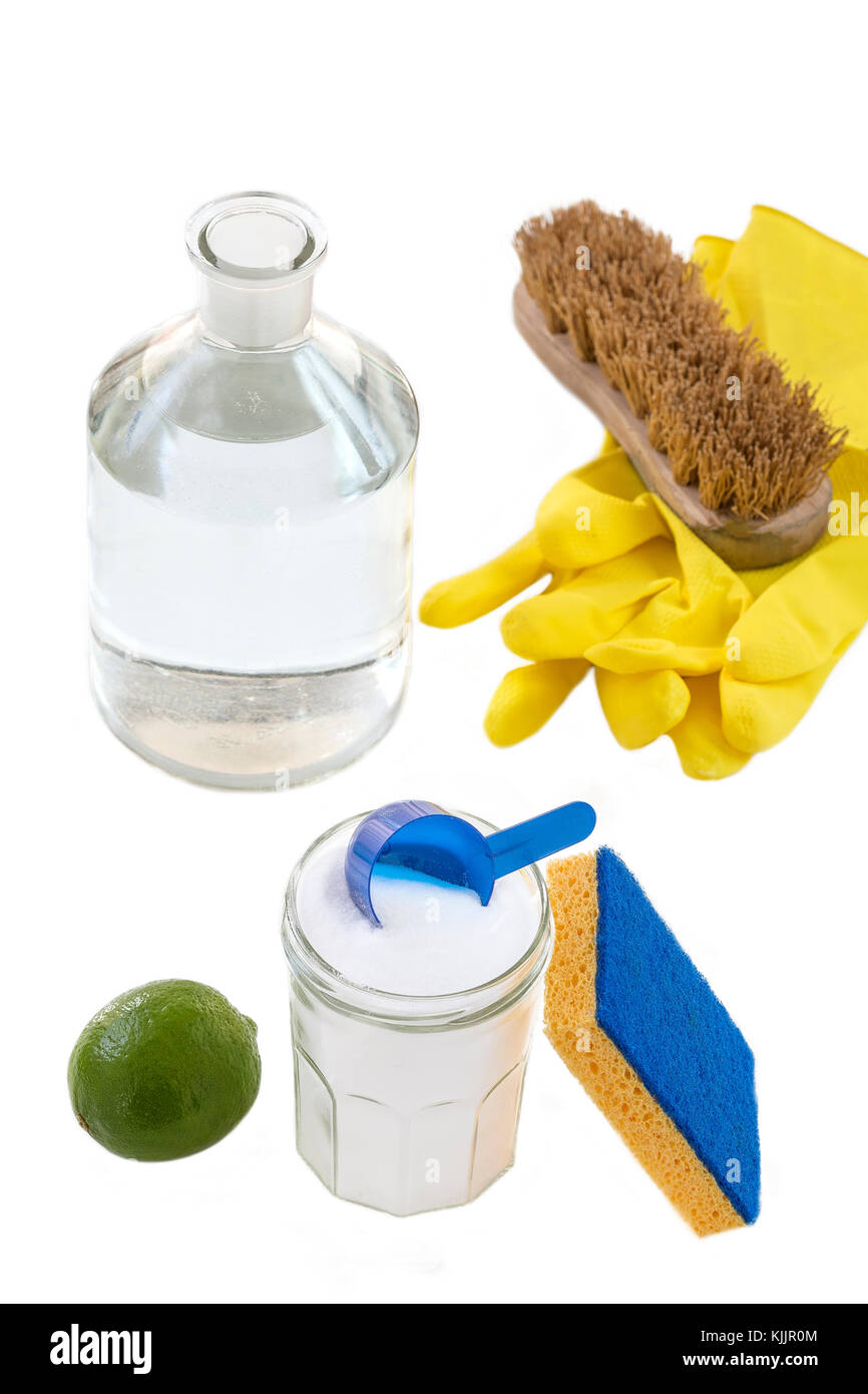 top view of baking soda with ,blue, spoon yellow gloves, brush lemon