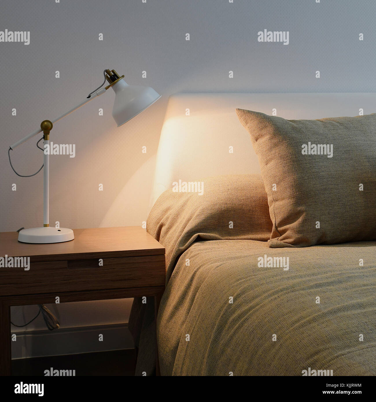 bedroom interior with reading lamp on bedside table Stock Photo Alamy