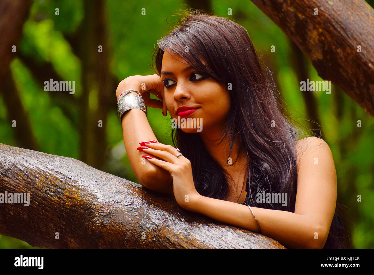 Indian girl with long hair hi-res stock photography and images - Alamy