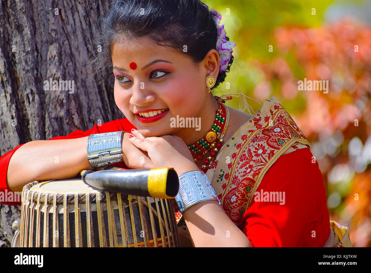 Assamese girl In traditional attire posing with A Dhol(Drum), Pune, Maharashtra Stock Photo Alamy