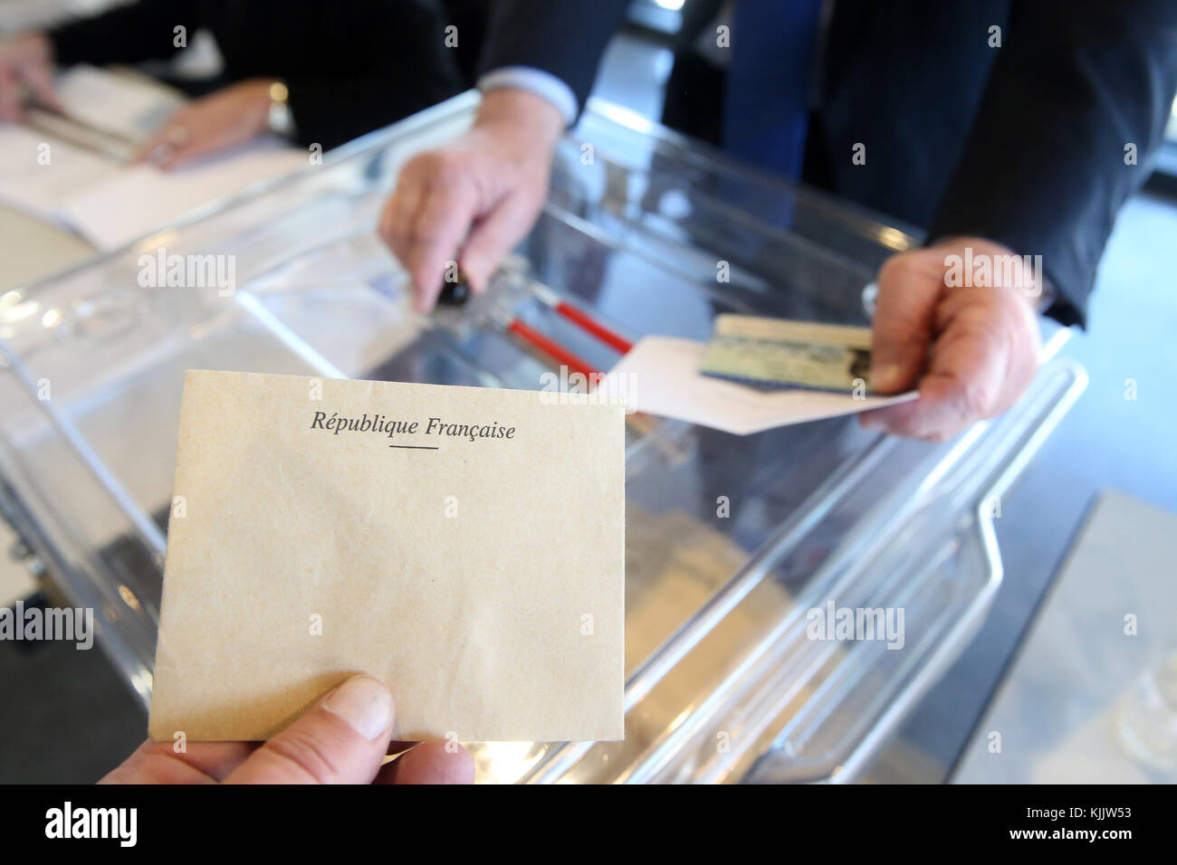 Polling Booth in France. Hand dropping ballot.  France. Stock Photo