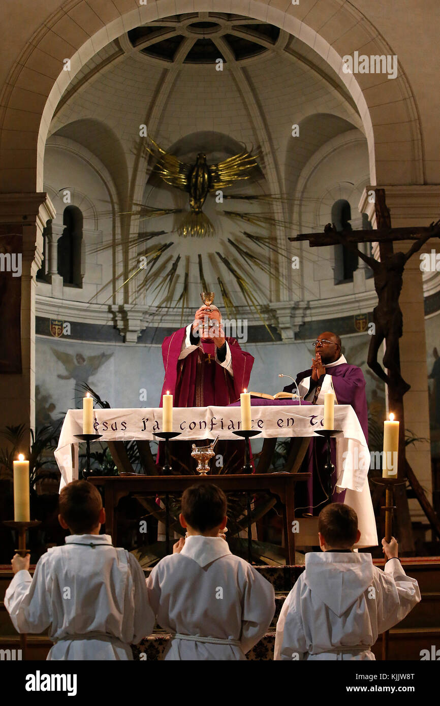 Ash wednesday celebration at Notre Dame du Travail Roman catholic church, Paris. France. Stock Photo