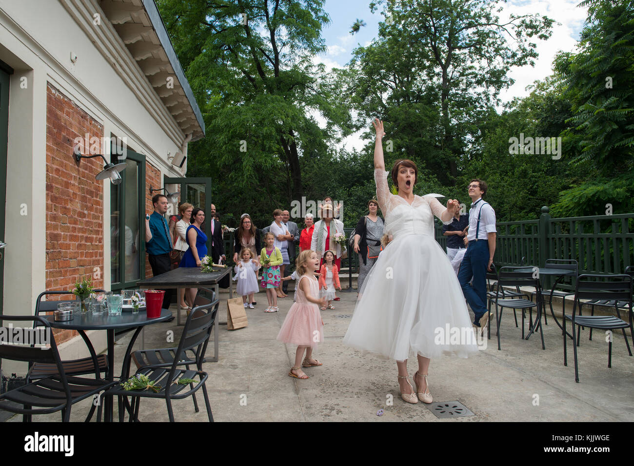 Bride throwing her bouquet. France. Stock Photo