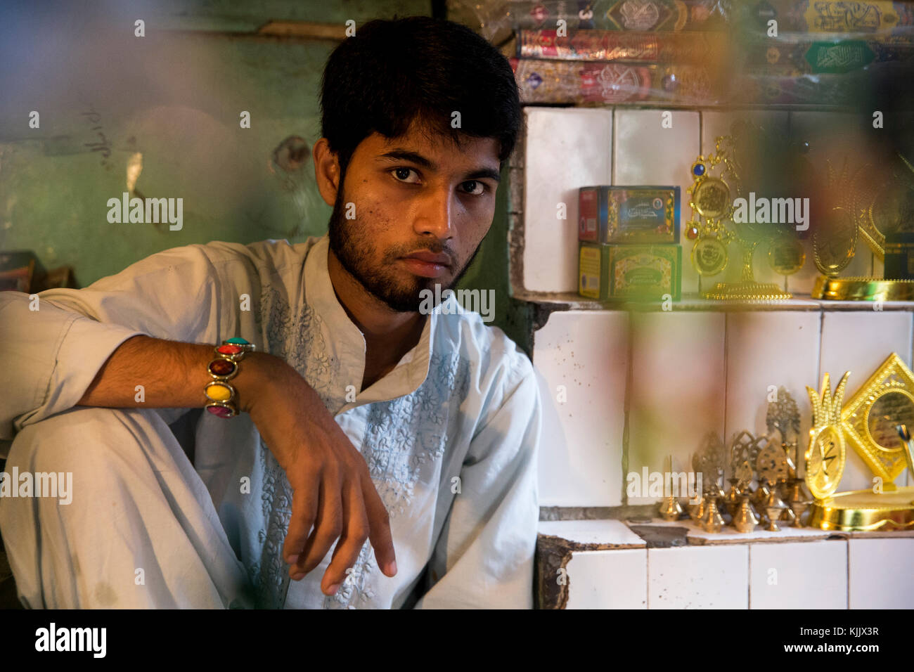 Shopkeeper outside Nizamuddin dergah, Delhi, India. Stock Photo