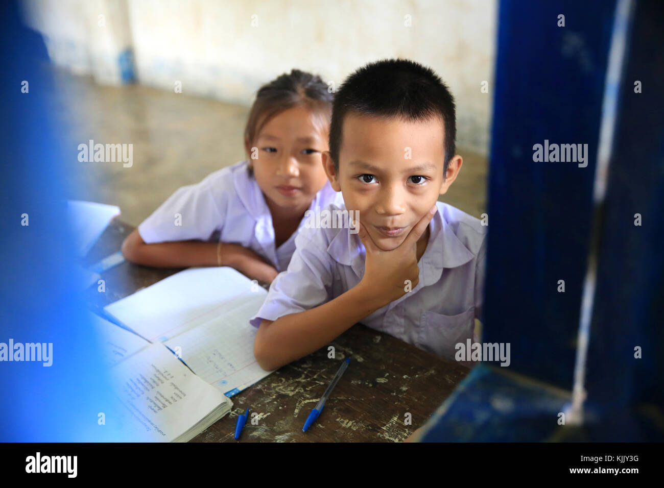 Elementary school. Schoolchildren in classroom. Laos. Stock Photo