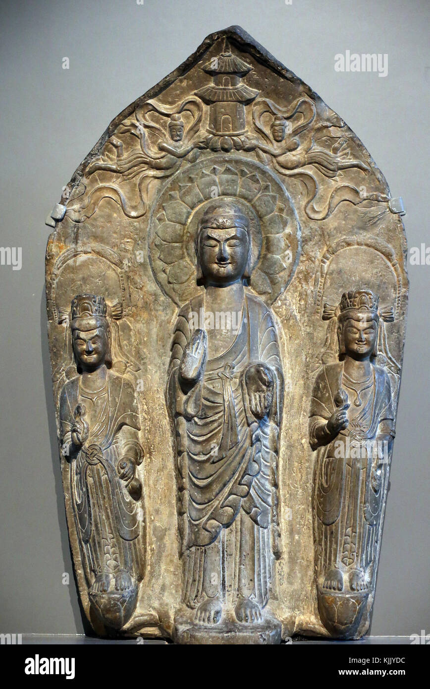 Asian Civlisations Museum. Stele with the Buddha, Avalokiteshvara and Maitreya. China (534-550).  Singapore. Stock Photo