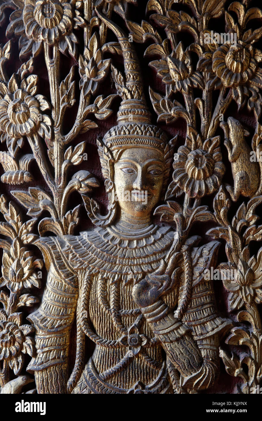 Reliefs on door at Wat Tung Yu, Chiang Mai. Thailand Stock Photo Alamy