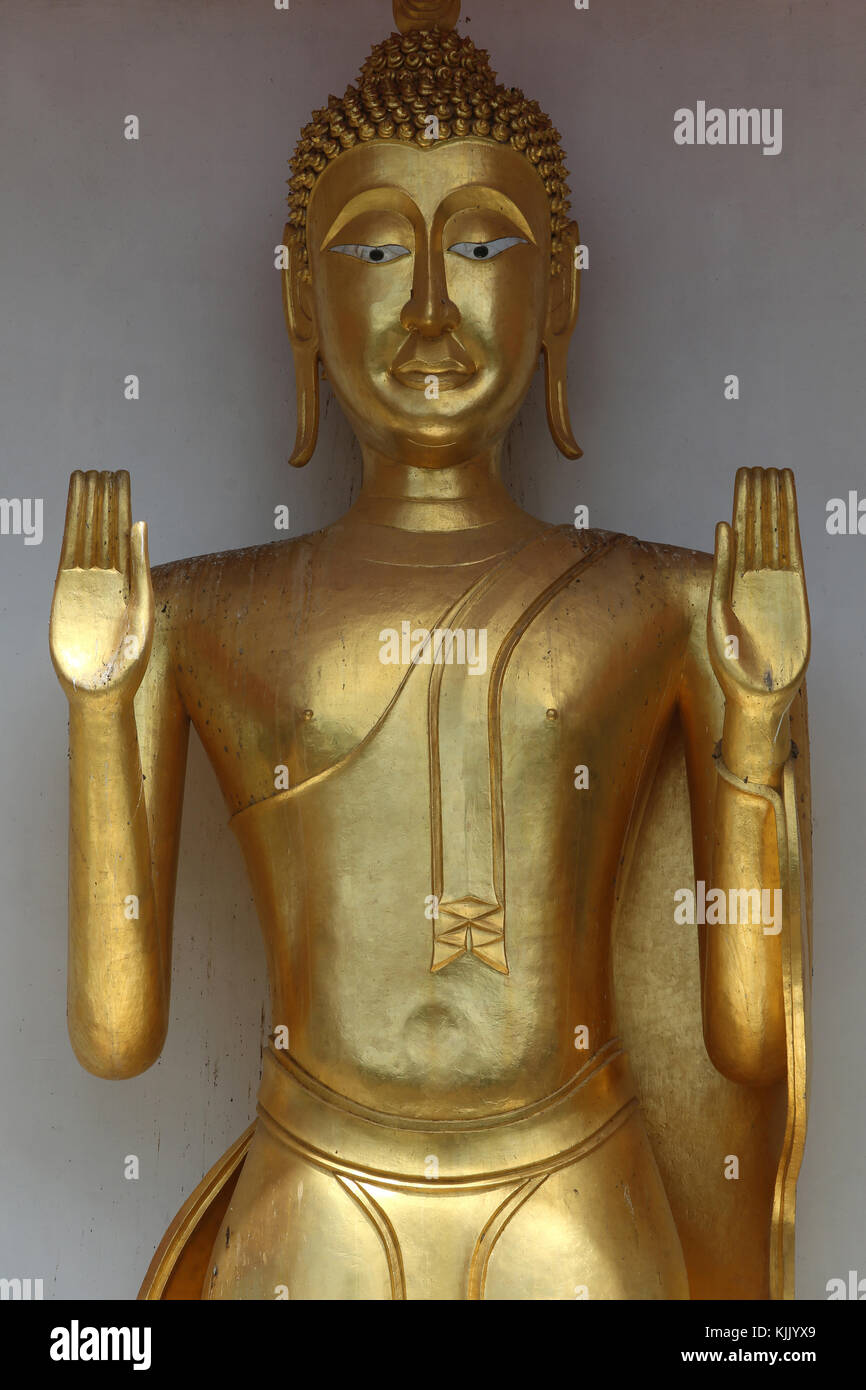 Detail of a Buddha statue in abhaya posture. Thailand. Stock Photo