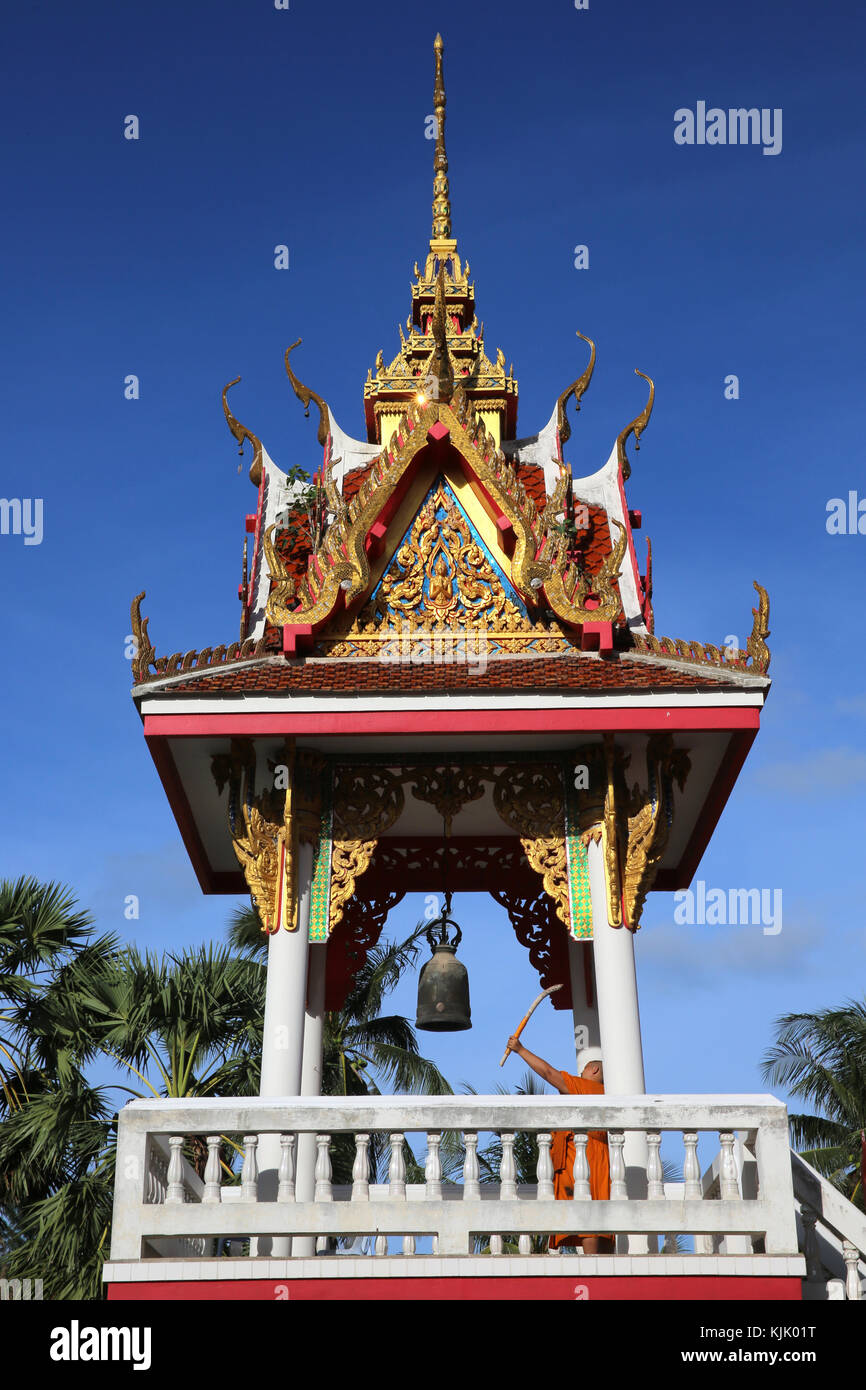 Monk beating the bell in Wat Sai Yoi, Hua Hin. Thailand. Stock Photo