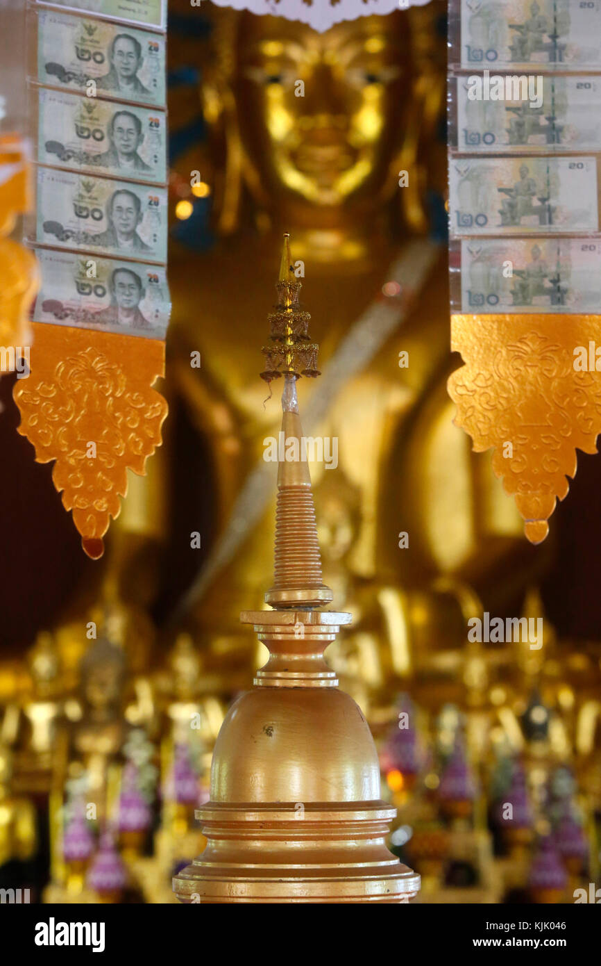 Offerings and stupa at Wat Chedi Luang, Chiang Mai. Thailand. Stock Photo