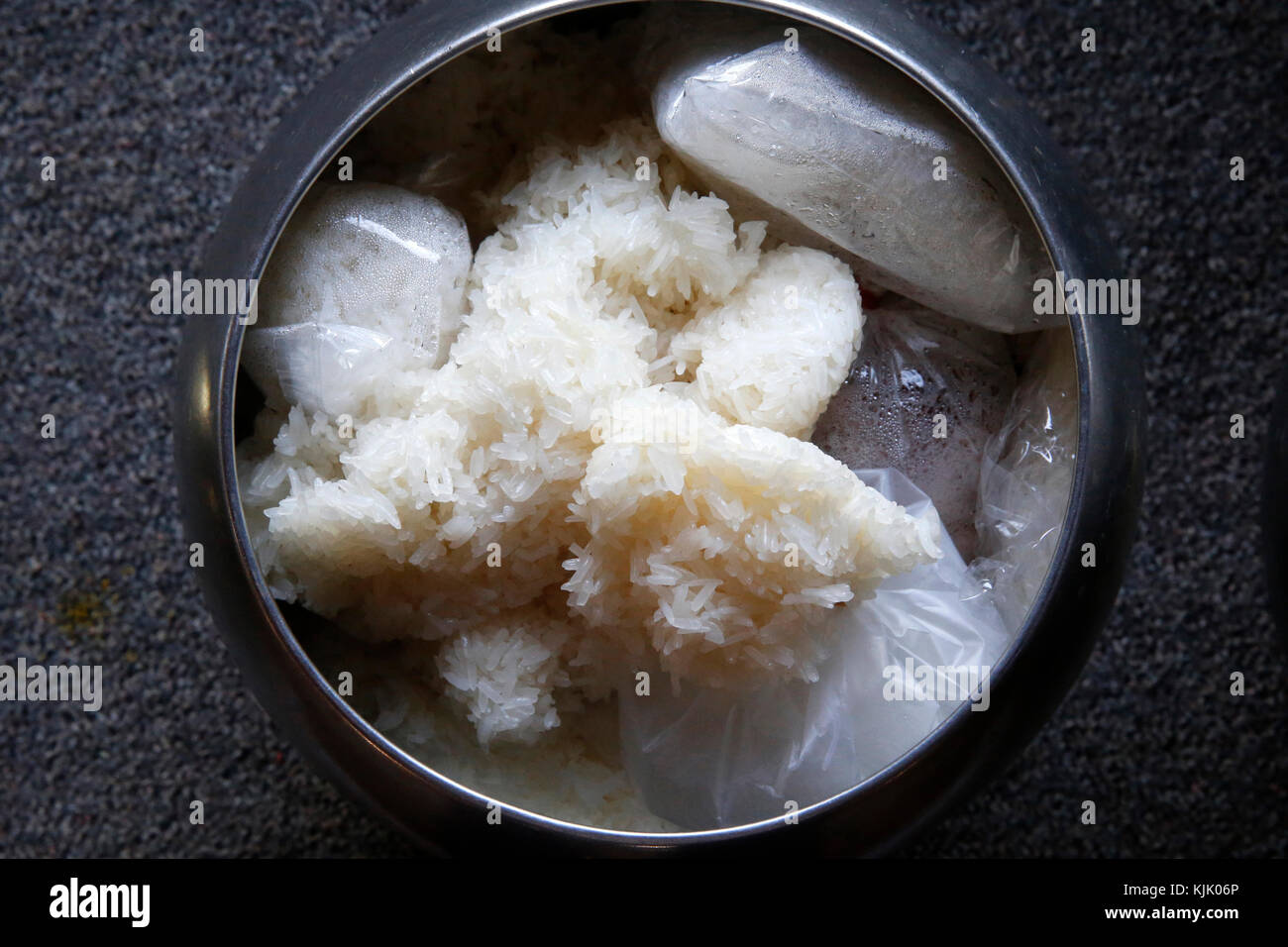 Rice in a Thai monk's alm bowl. Thailand. Stock Photo