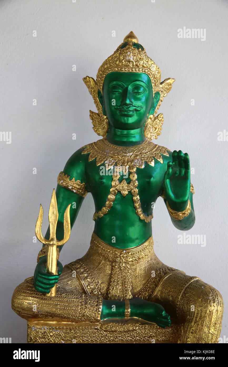 Green and golden Indra statue in Hua Hin. Thailand. Stock Photo