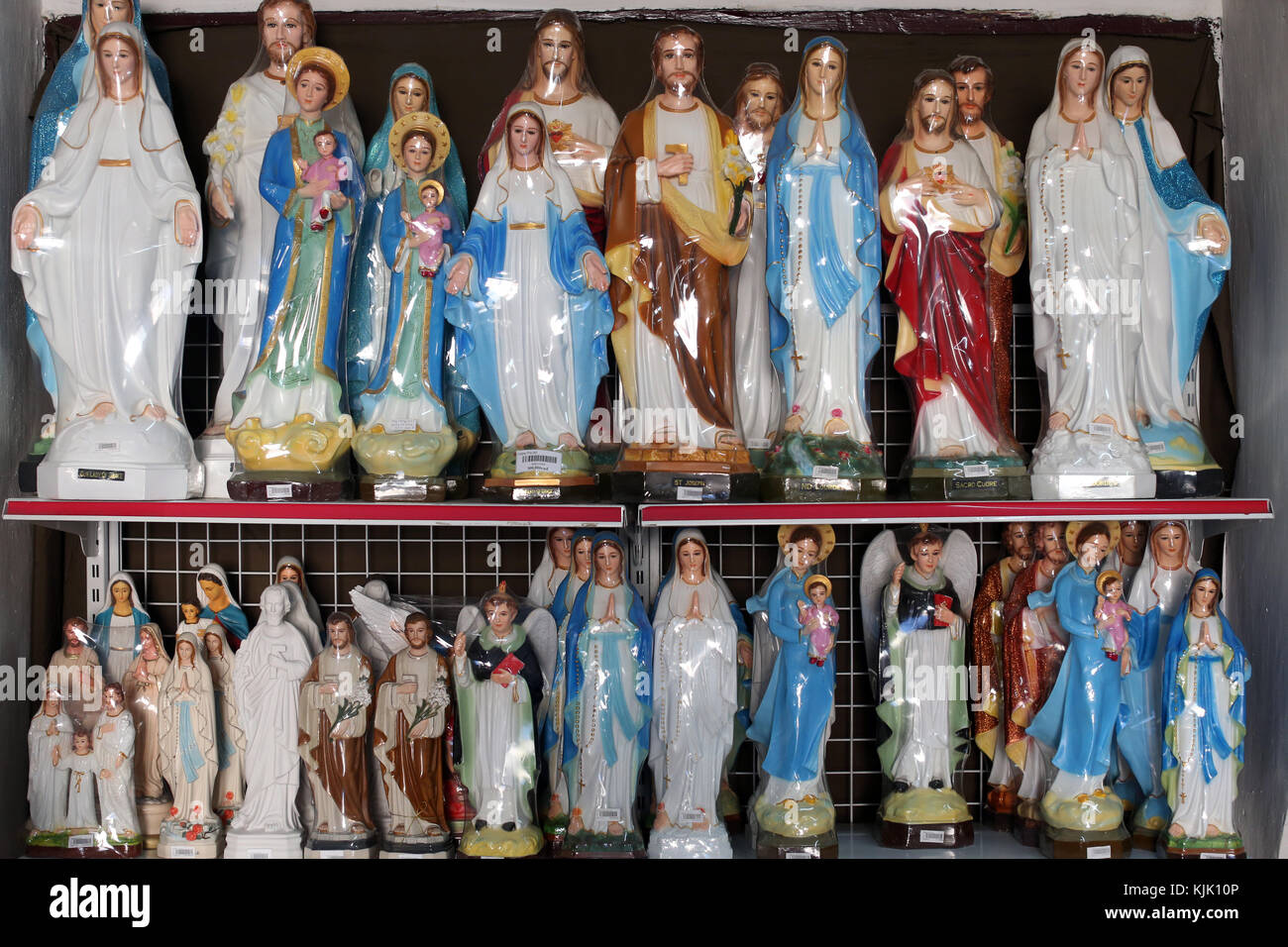 Catholic faith store. Religious articles. Virgin Mary and Jesus.  Dalat. Vietnam. Stock Photo
