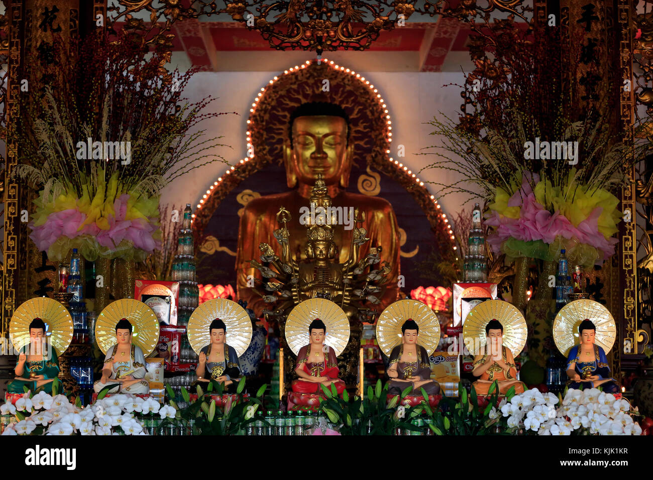 Chua Vinh Nghiem buddhist pagoda.  Altar with Buddha statues.  Ho Chi Minh City.  Vietnam. Stock Photo
