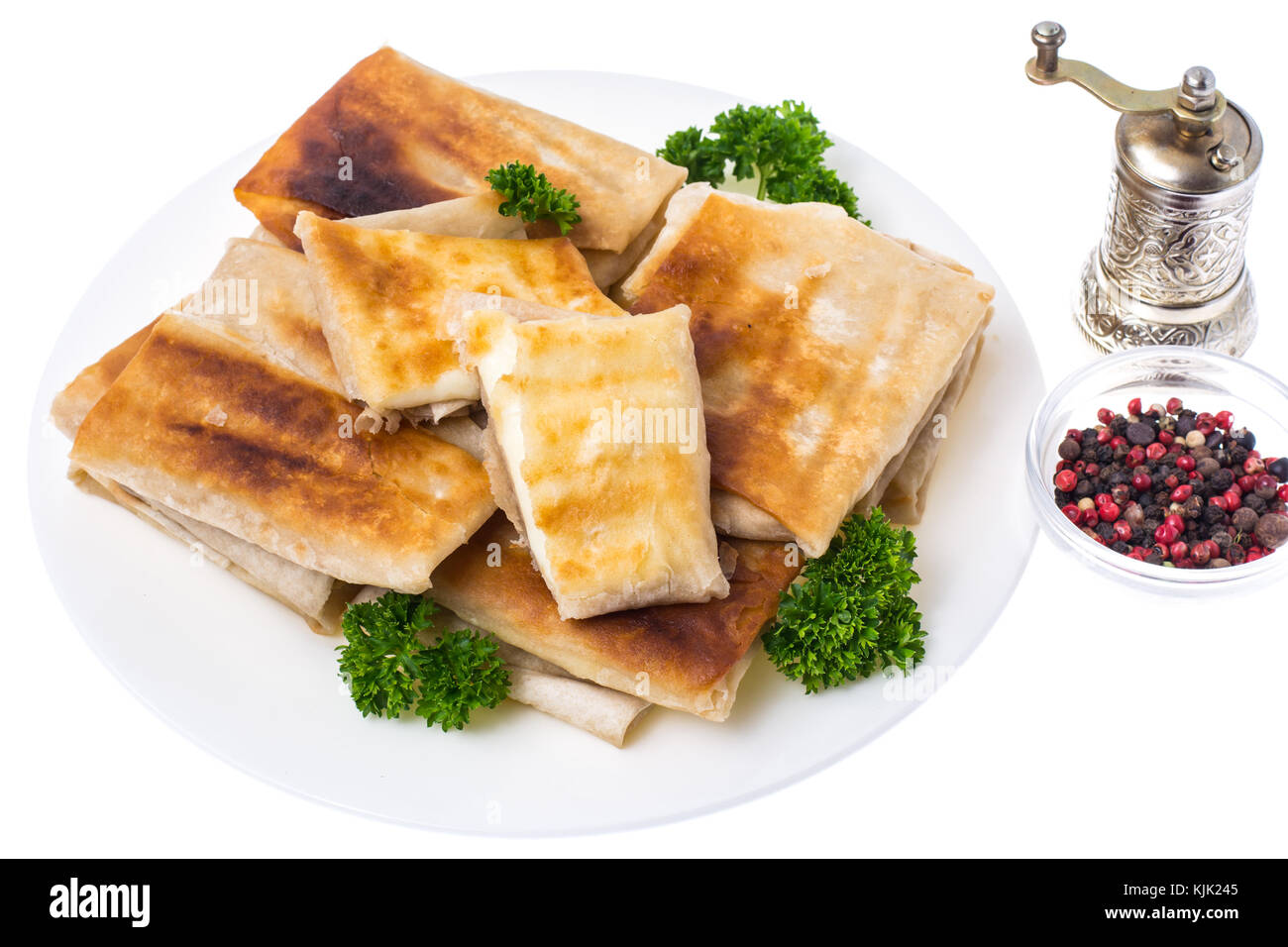 Grilled pita bread with cheese filling, close up,delicious and hearty breakfast. Studio Photo Stock Photo