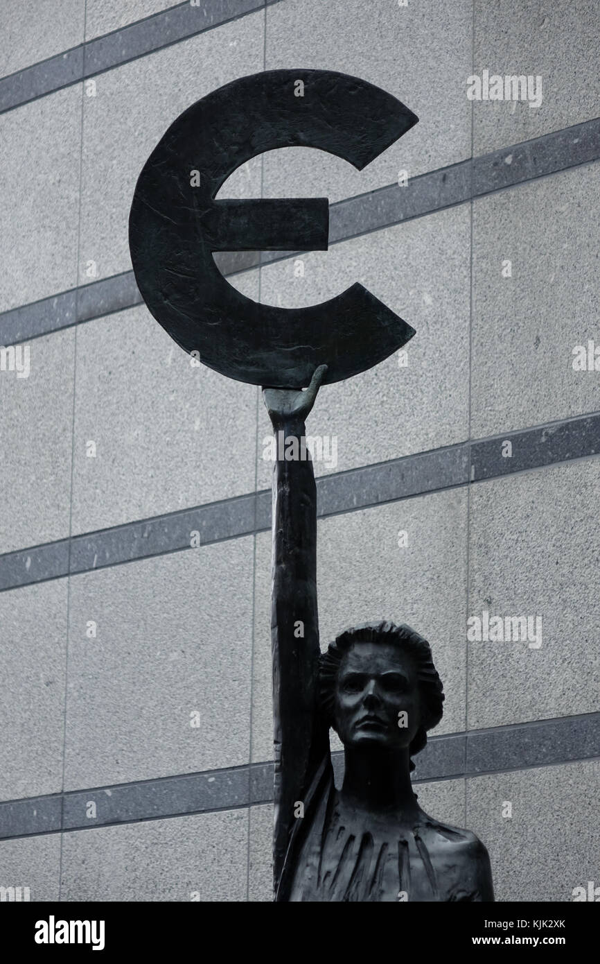 A Bronze statue of the goddess Europa holding a euro symbol outside the ...