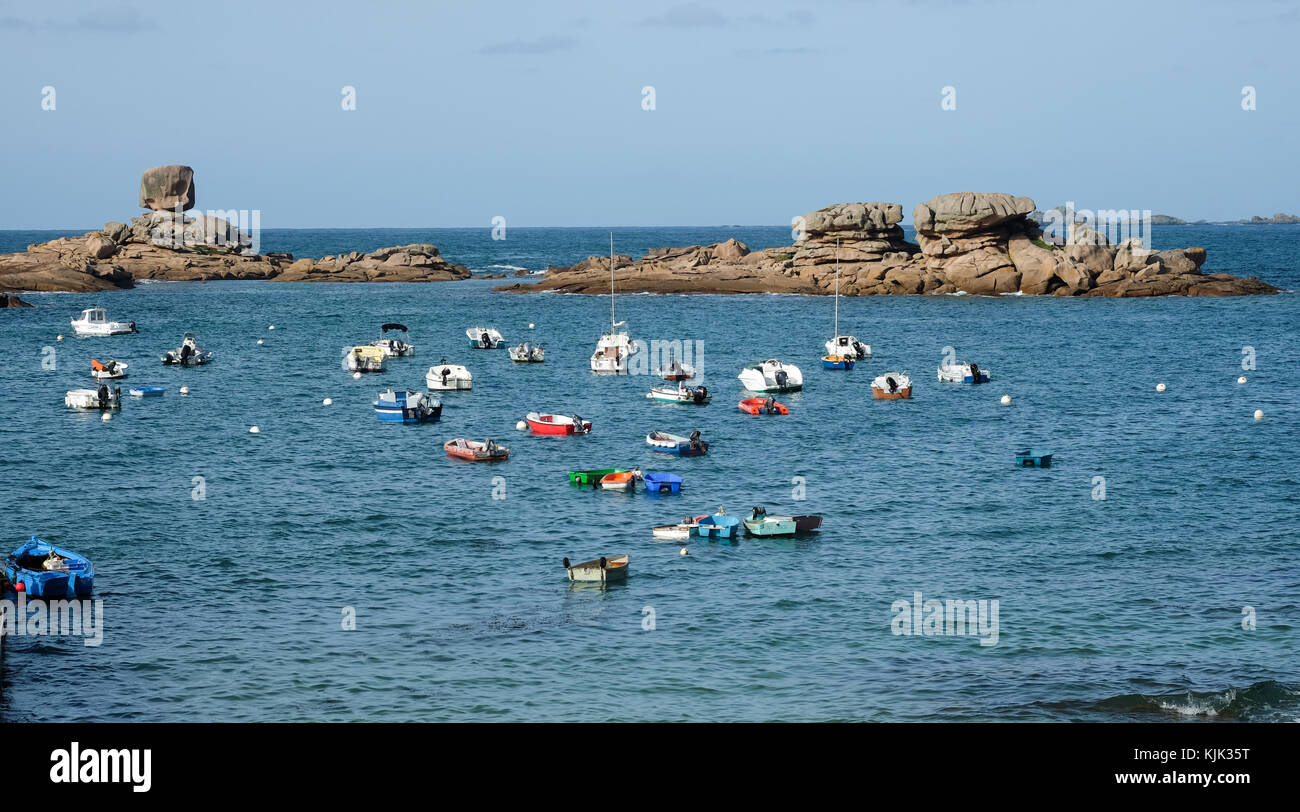 Pink Rocks France Distinctive and oddly formed rocks and several boats at the pink ...