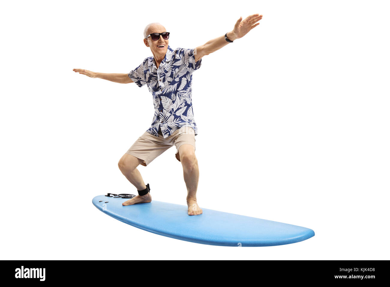 Joyful elderly man surfing isolated on white background Stock Photo
