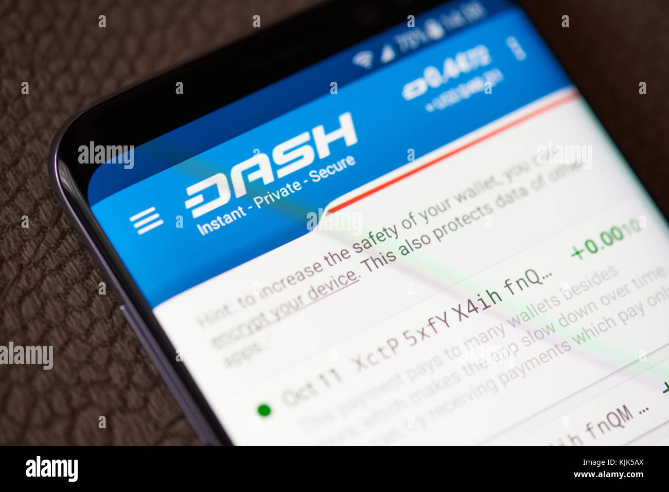 New york, USA - November 24, 2017: Dashcoin wallet on smartphone screen.  Exchanging dashcoins between people Stock Photo