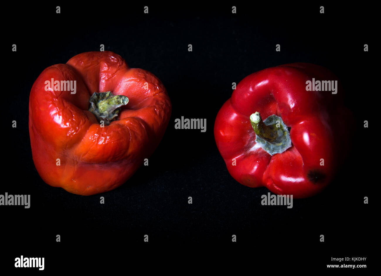 Red moldy pepper isolated on a black background Stock Photo Alamy