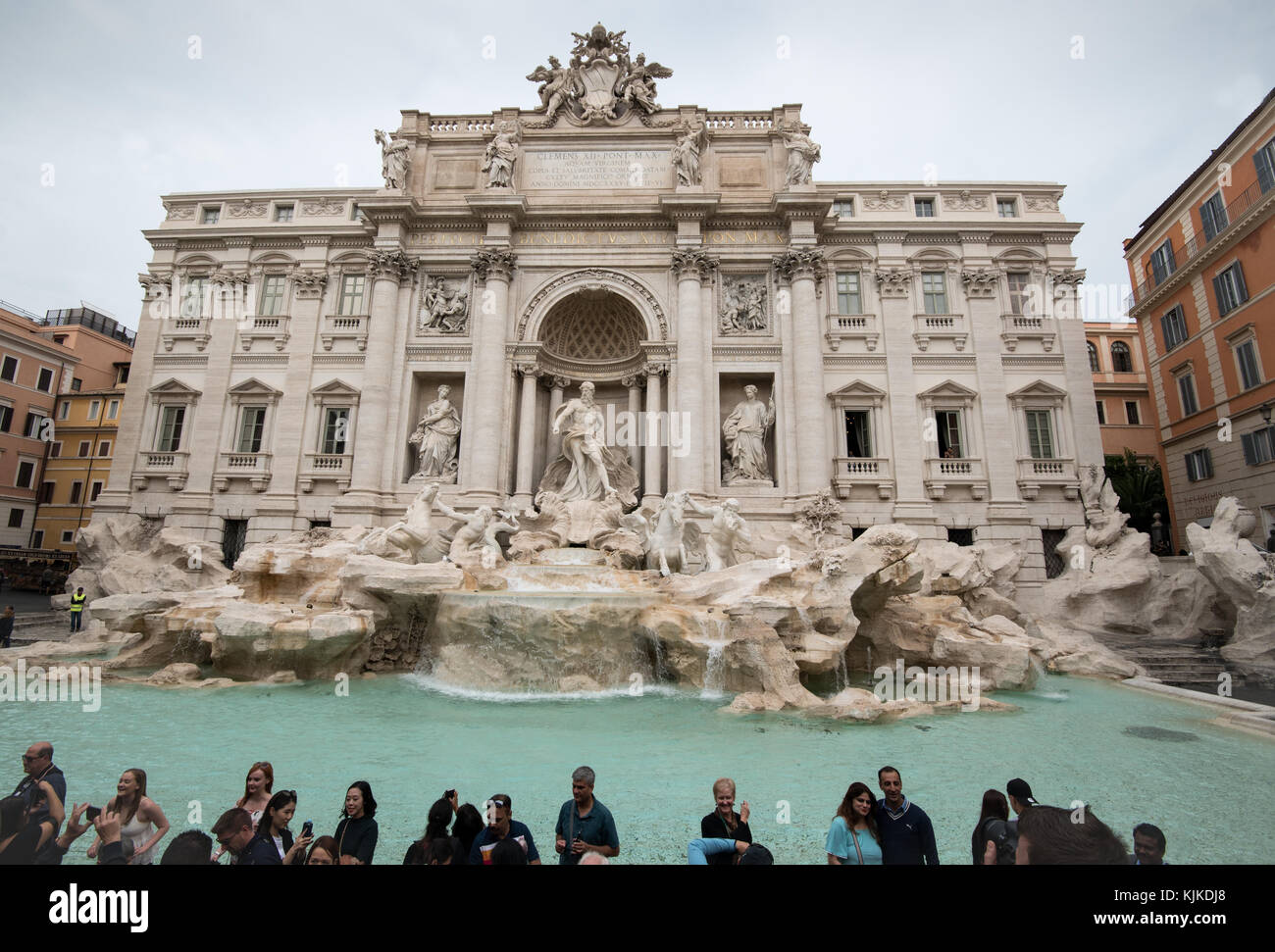 Rome, Italy - October 1 2017: Tourists in front of  The Trevi Fountain, or Fontana di Trevi, the largest and most famous Baroque fountain in Europe Stock Photo