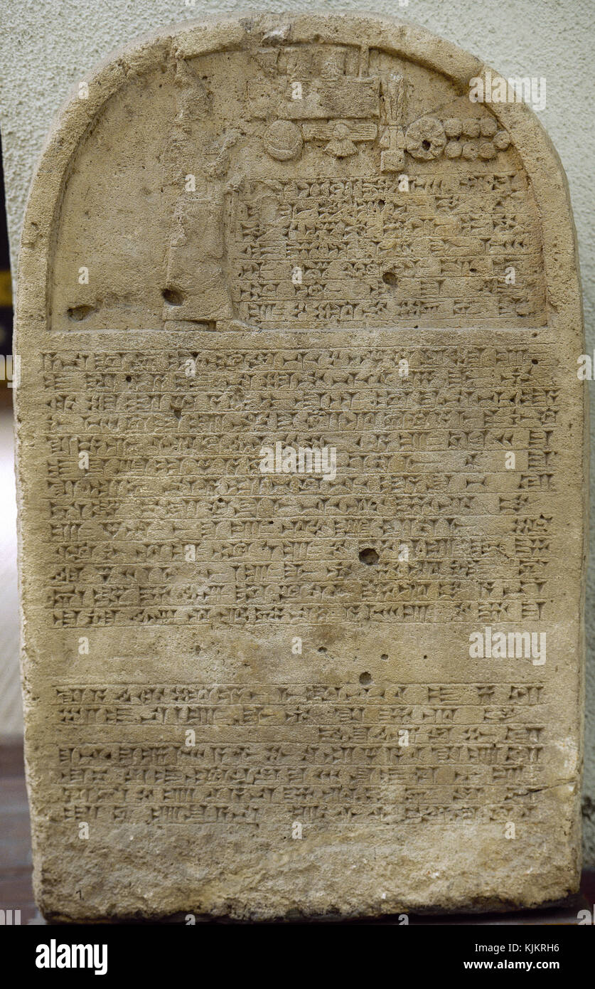 Limestone stele of king of Assyria Sennacherib (705-681 BCE) from Nineveh. Sargonid dynsty. Conmemore a victory. The relief represents the king praying before divine symbols. Limestone stele of king os Assyria Sennacherib (705-681 BCE) from Nineveh. Sargonid dynsty. Conmemore a victory. The relief represents the king praying before divine symbols. Ancient Orient Museum, Istanbul Archaeological Museums, Turkey. Stock Photo