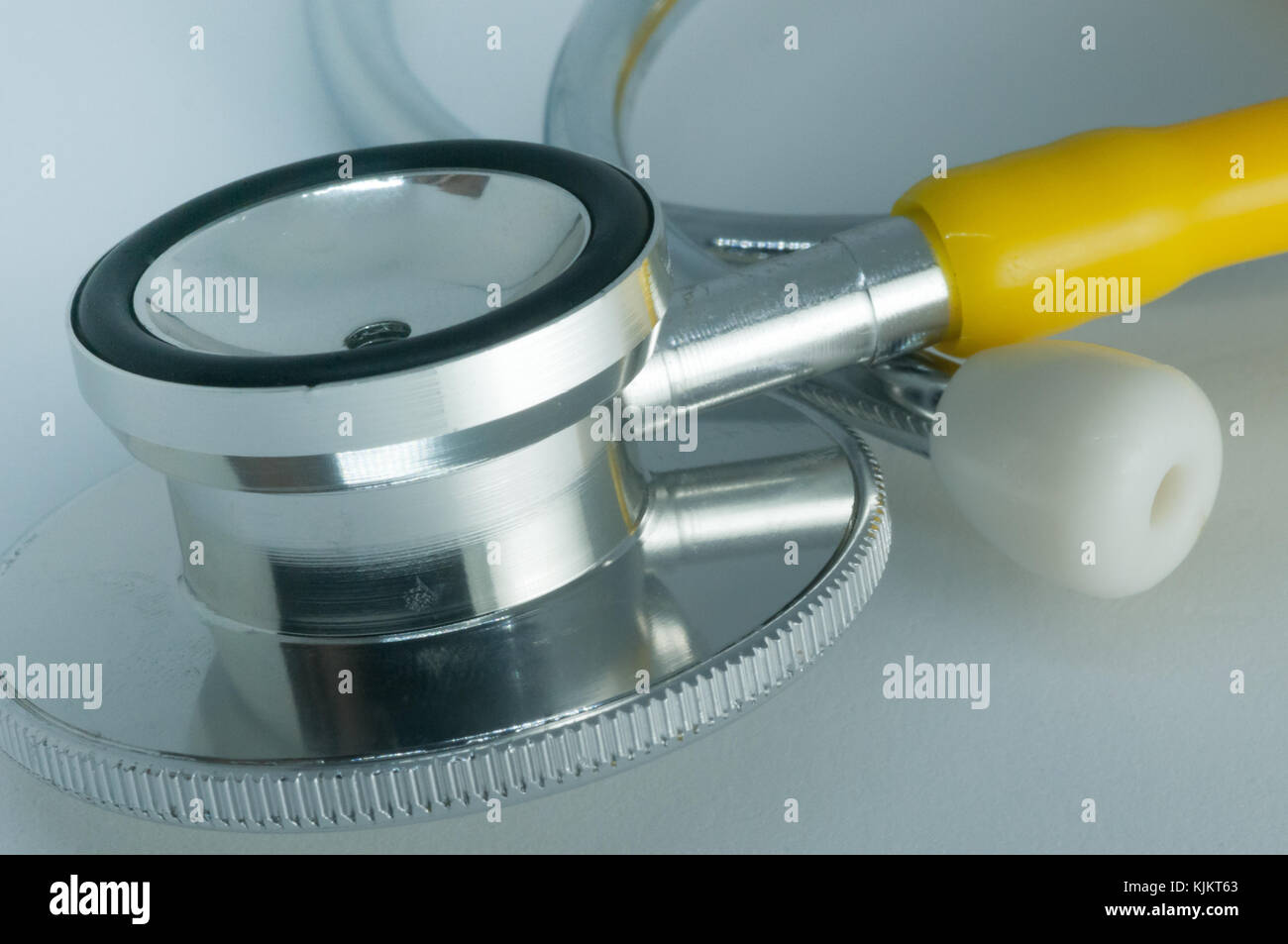 Yellow Stethoscope on a white background Stock Photo Alamy