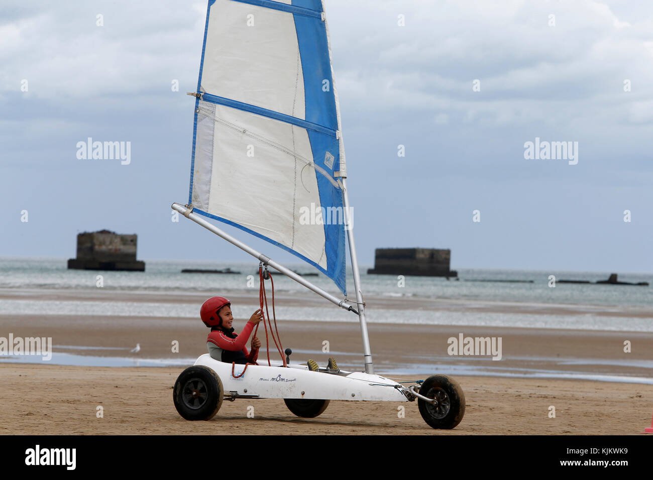 10-year-old boy sand yachting. France. Stock Photo