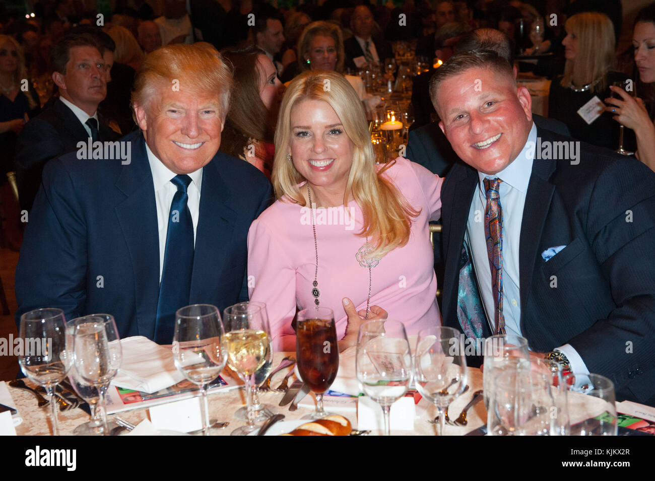 PALM BEACH, FL - MARCH 20:  Presidential candidate Donald Trump and Keynote Speaker Donald Trump, Florida Attorney General Pam Bondi, along with guest Dr. Ben Carson attend the Palm Beach Lincoln Day Dinner at The Mar-a-Largo Club on March 20, 2016 in Palm Beach, Florida.  People:  Donald Trump, Pam Bondi, Blaise Ingoglia Stock Photo