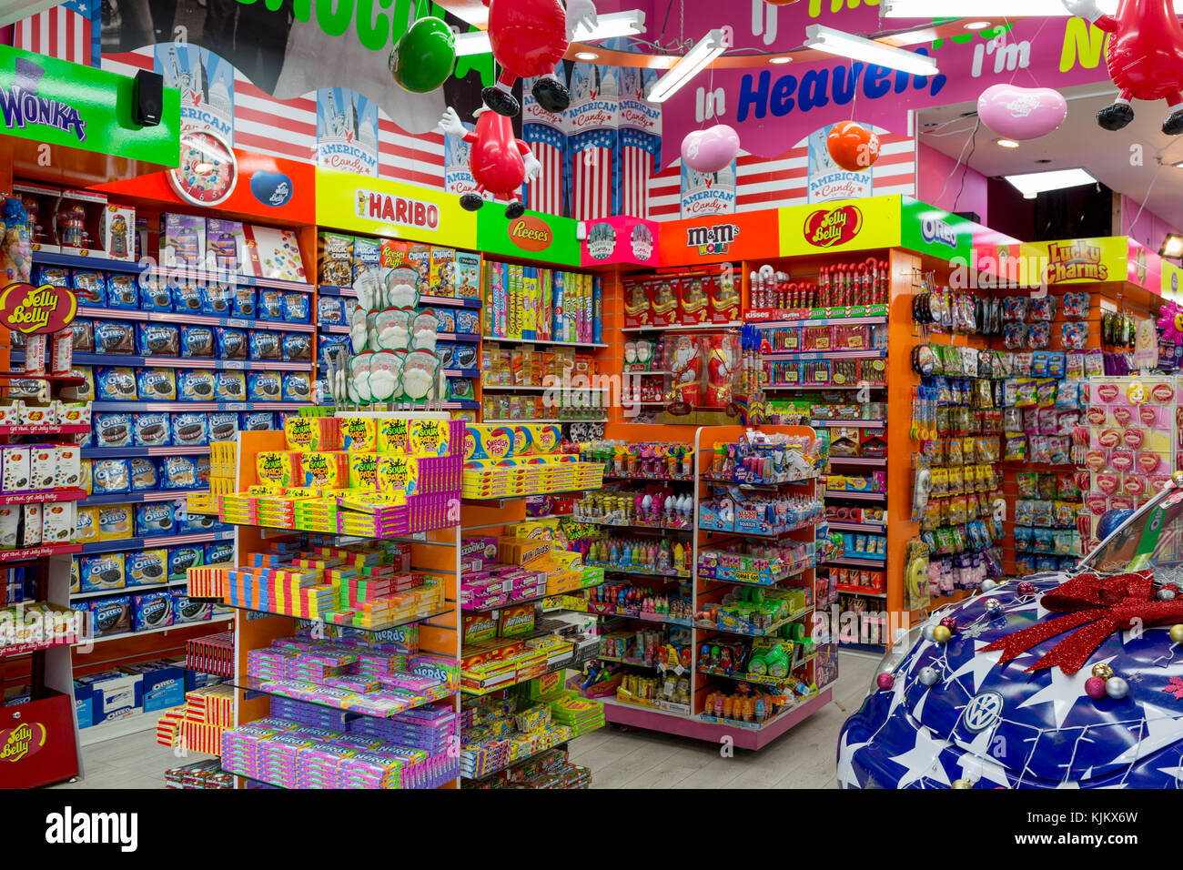 Garish merchandising, confectionary stock and shop fittings in American Candy, on Oxford Street, on 22nd November 2017, in London England. Stock Photo
