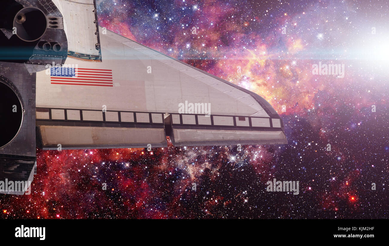 Space shuttle spaceship in universe. Elements of this image furnished by NASA. Stock Photo