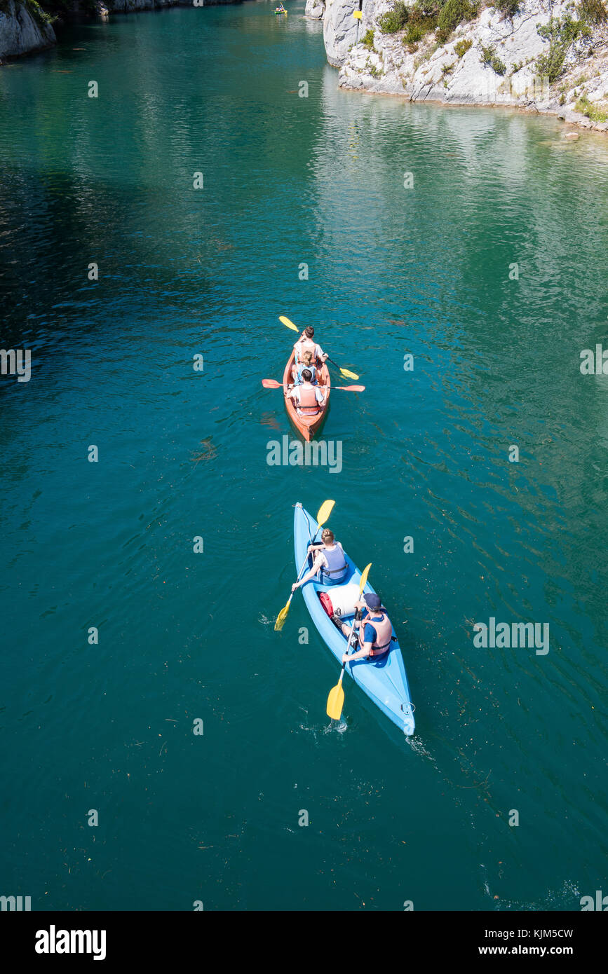 Riding canoe in river Stock Photo Alamy