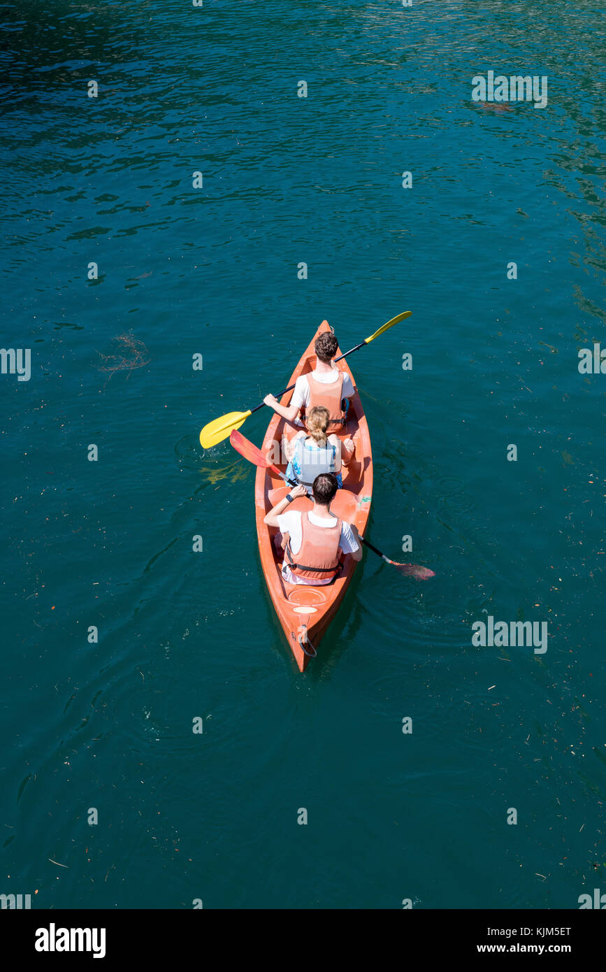 Riding canoe in river Stock Photo Alamy