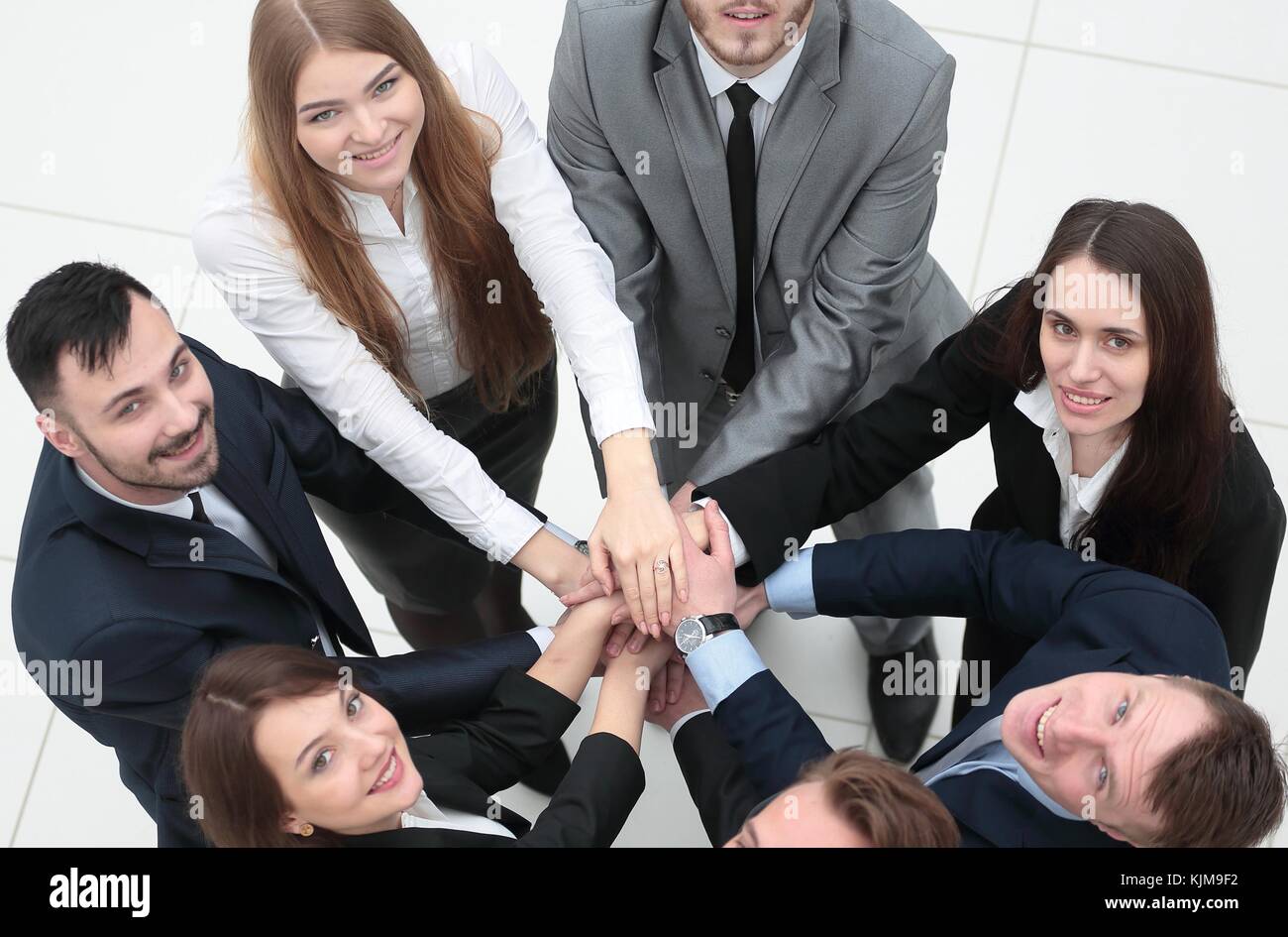 business team formed into a circle Stock Photo