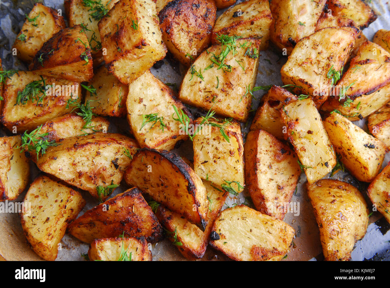 close up of the roasted potatoes Stock Photo - Alamy