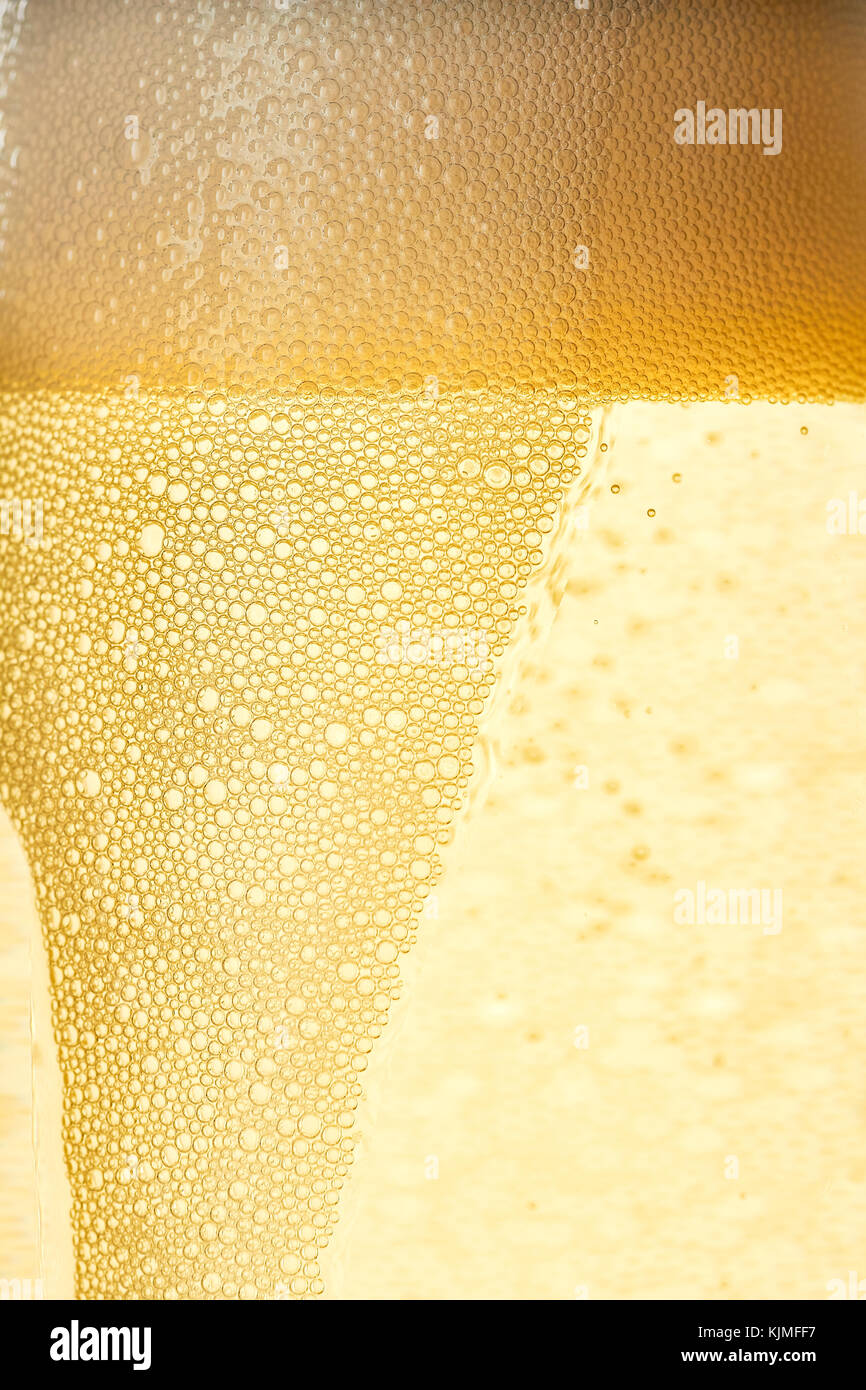 Closeup fo champagne foam and bubbles Stock Photo