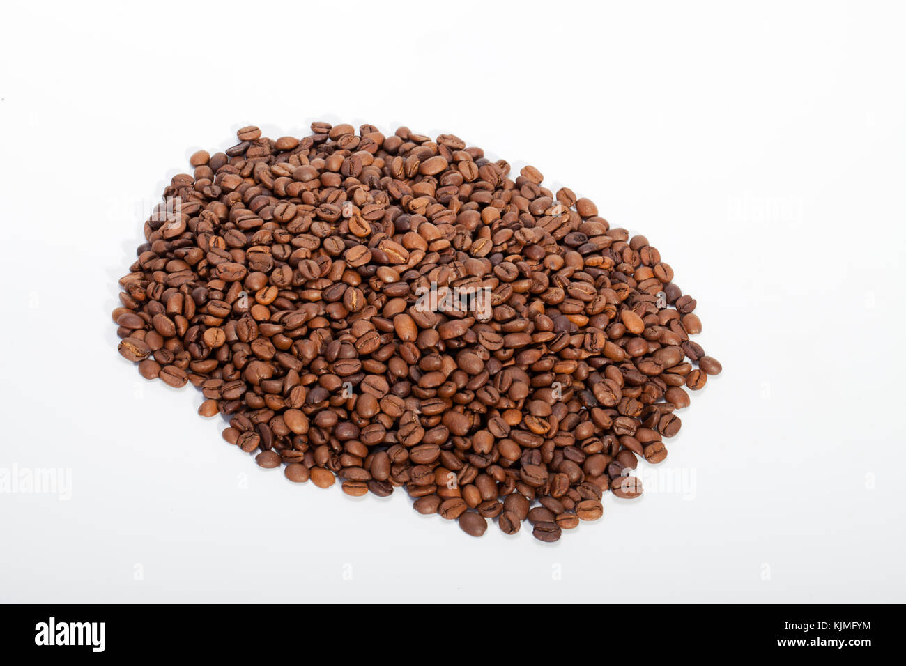 coffee beans close up isolated on white Stock Photo - Alamy