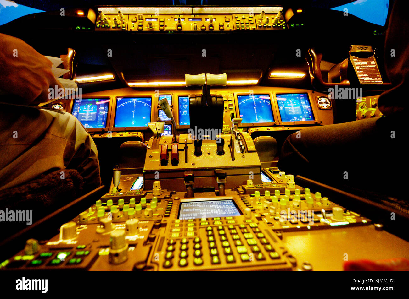 throttles, controls and screens in the CAE Boeing 777-236 glass-cockpit cockpit simulator with Evans & Sutherland visual systems Stock Photo