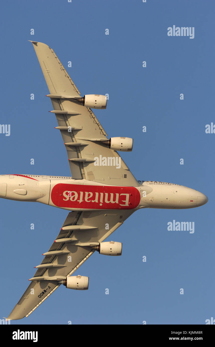Airbus A380 prototype aircraft serial number msn004 knife-edge flypast showing 'Emirates' logo advert underneath Stock Photo