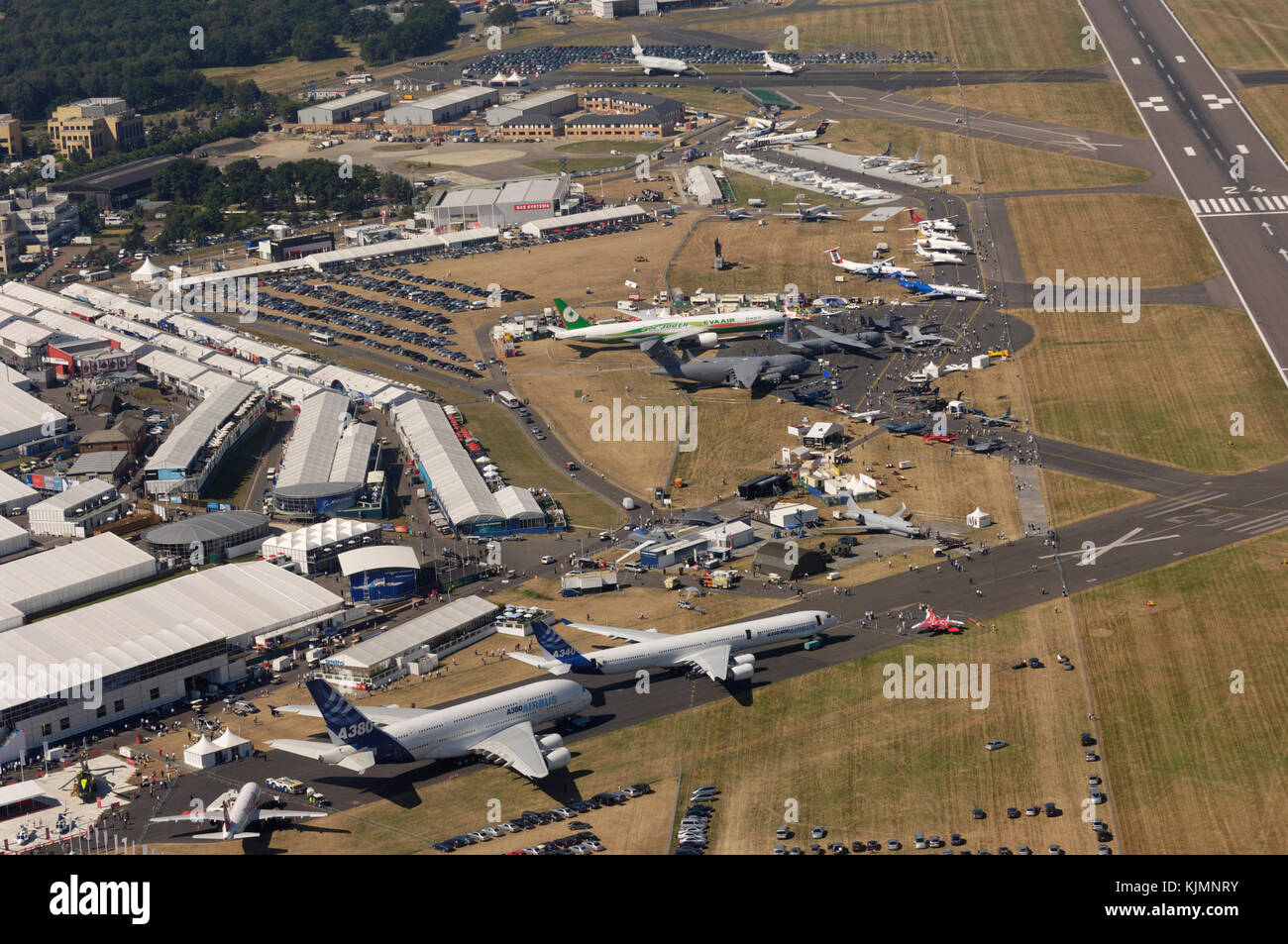 Airbus A380-800, Kingfisher Airlines A320-200, A340-600, EVA Air Boeing 777-300 ER and USAF C-17A Globemaster III parked in the static-display at the Stock Photo