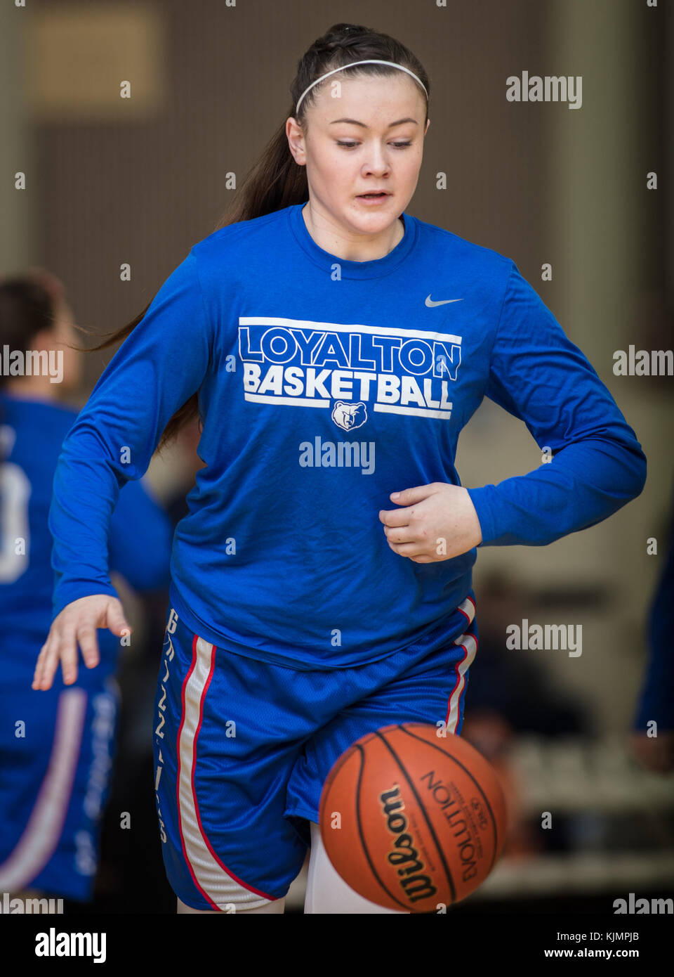 High school basketball action with Fall River vs. Loyalton in at the Shasta College Gym in Redding, California. Stock Photo