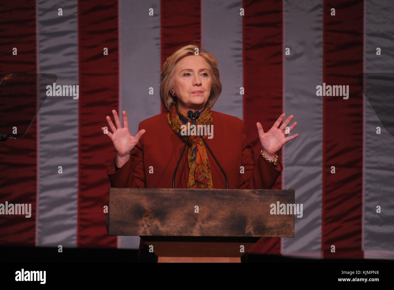 NEW YORK, NY - FEBRUARY 16: Democratic presidential candidate and former U.S. Secretary of State Hillary Clinton (R) listens as Rep. Charlie Rangel (D-NY13) introduces her at the Schomburg Center for Research in Black Culture on February 16, 2016 in New York City. Clinton is hoping to win the upcoming South Carolina and Nevada primaries  People:  Hillary Clinton Stock Photo