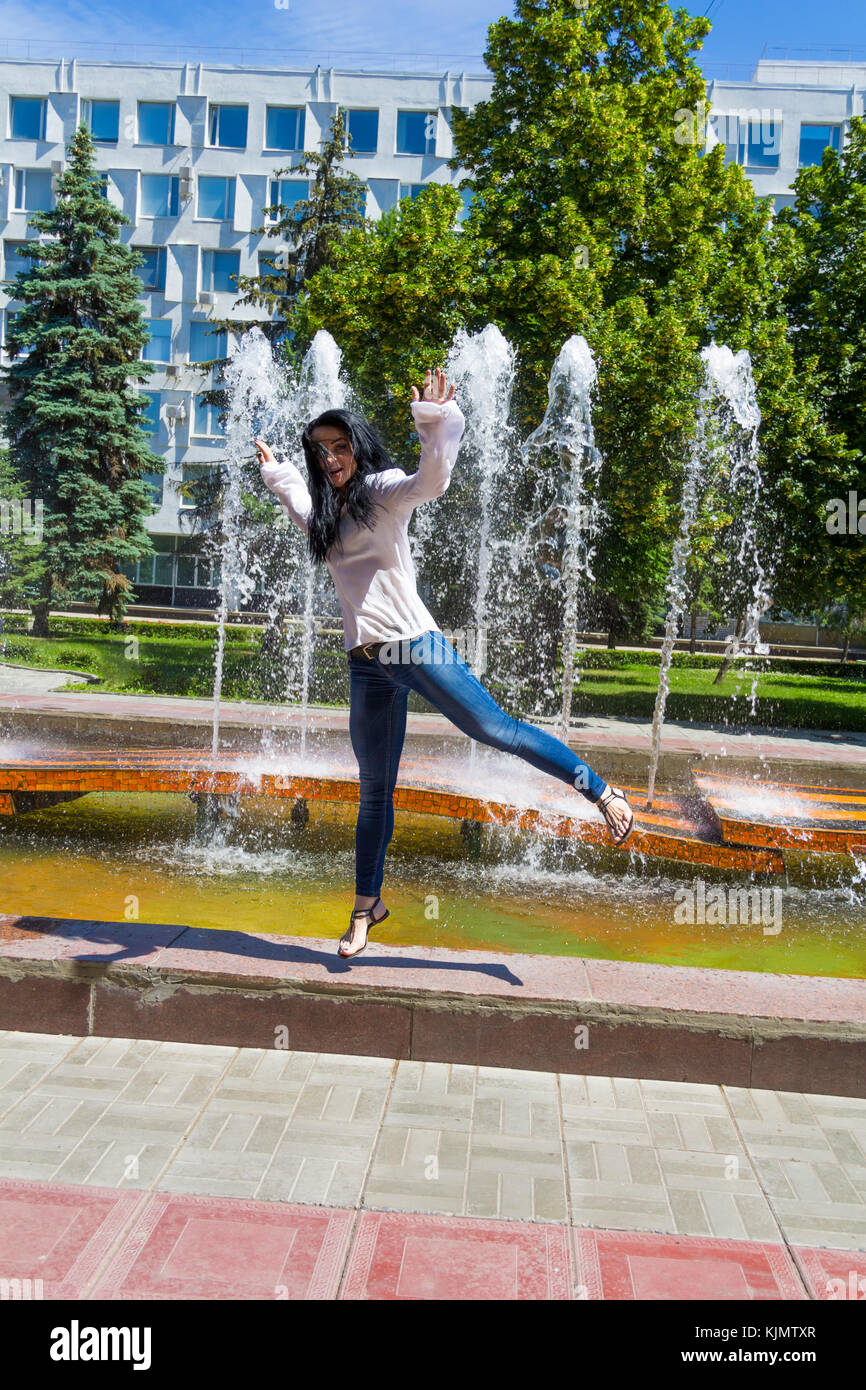 Girl jumping in river hi-res stock photography and images - Alamy