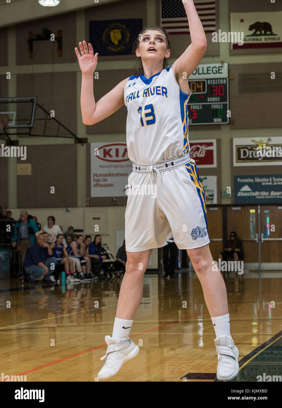 High school basketball action with Fall River vs. Loyalton in at the Shasta College Gym in Redding, California. Stock Photo